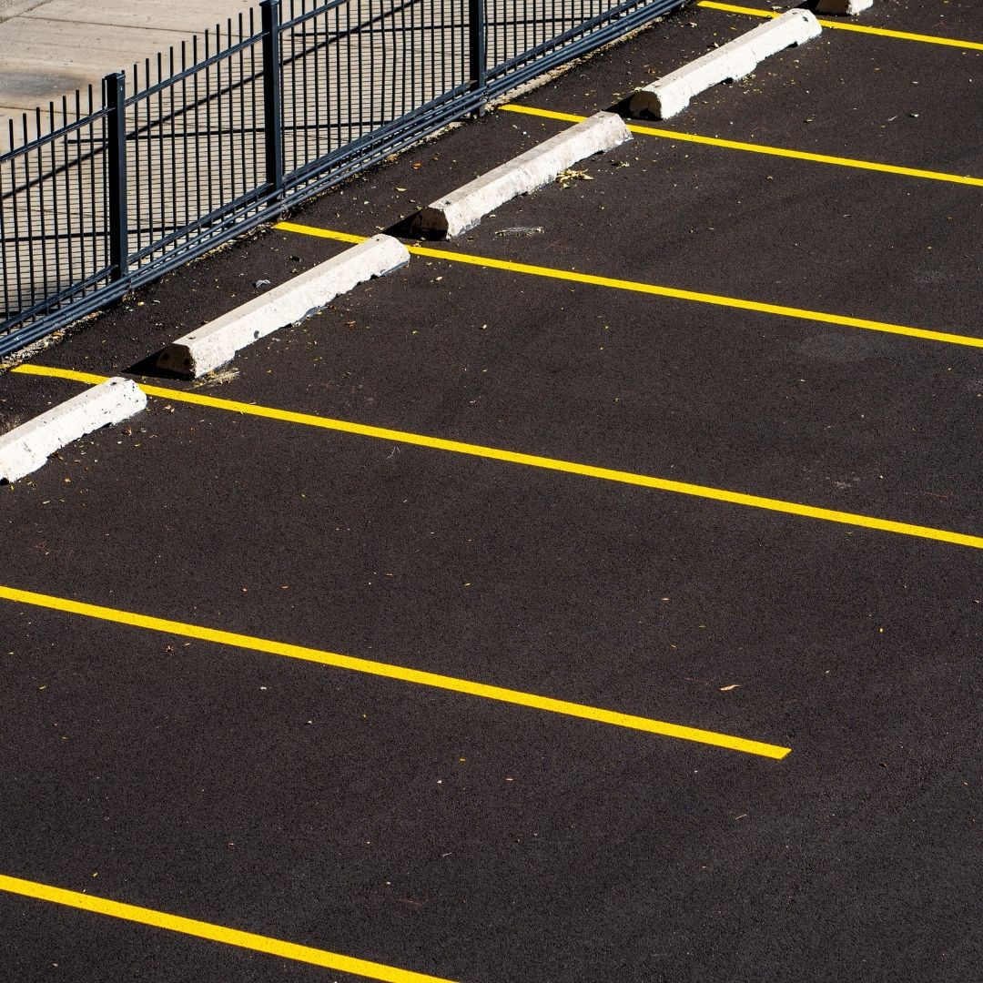 Featured image for “Parking Lot Line Painting: A Guide to Preparing and Marking Your Parking Areas”